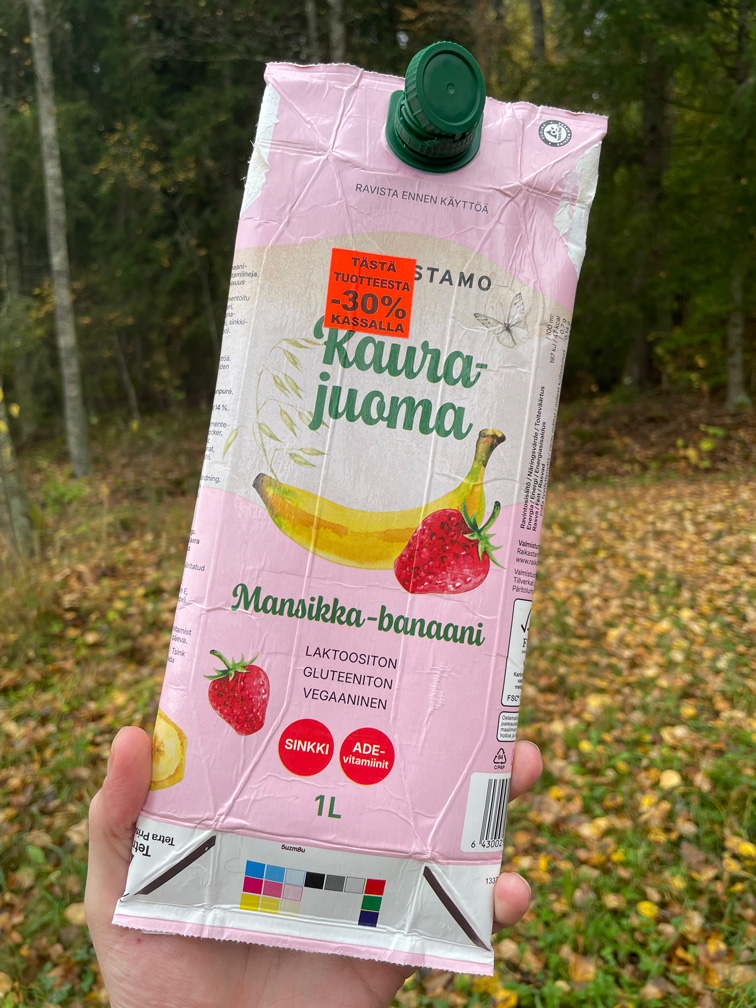 Picture of oat drink with discount label.